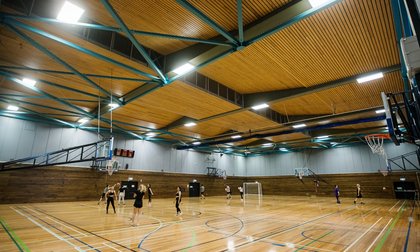 Students play indoor sports on the indoor courts
