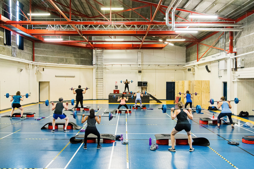 Group fitness class in progress in the multi-purpose indoor Activity Centre