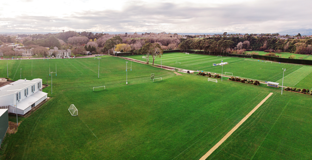 Aerial photo of 11 field spaces for events and sports games including rugby, football, and Ultimate Frisbee.