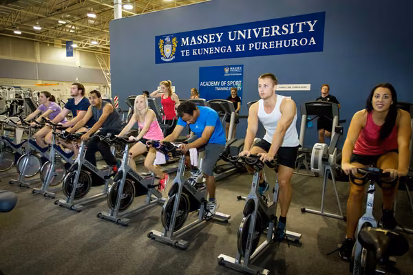 People using stationary bikes in Auckland Recreation Centre