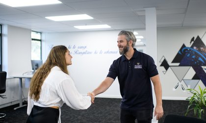 Jobs at Massey banner image - two people shaking hands