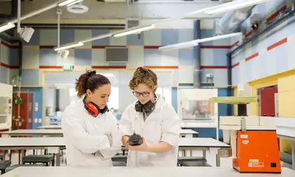 Two health students in lab.