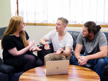 Creative writing students having a conversation.