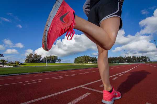 feet running on a track