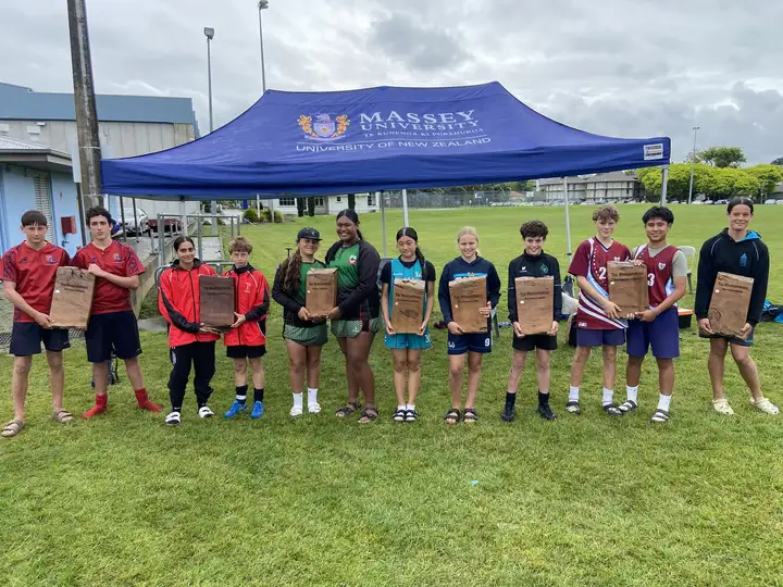 Young athletes with their awards