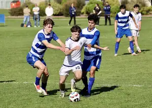 boys playing football