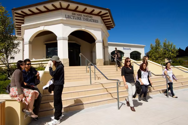 Group of students walking out of Sir Neil Waters Lecture Theatres