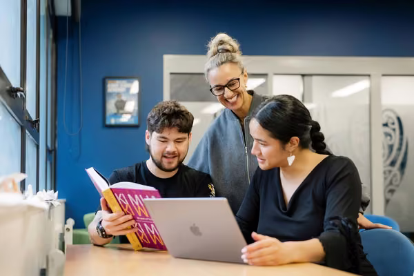 Te Rau Tauawhi interior space, where staff are helping students