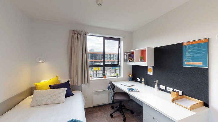 Matipo, Titoki and Tānekaha apartments' single bedroom with bed, desk and chair