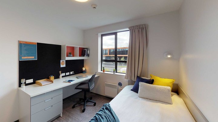 Matipo, Titoki and Tānekaha apartments' single bedroom with bed, desk and chair