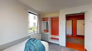 Pūkeko, Tui and Weka halls' single bedroom with bed, drawers and wardrobe