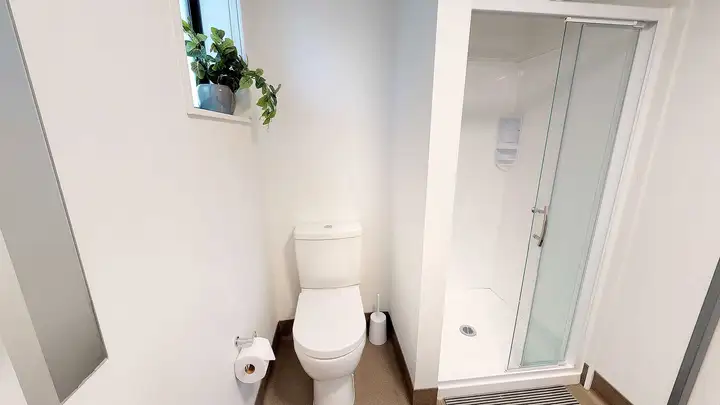 Studio Unit bathroom with toilet and shower