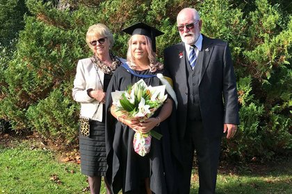 Amy Pomana and her grandparents Ngaere and Rex Pennell at her graduation in 2018.