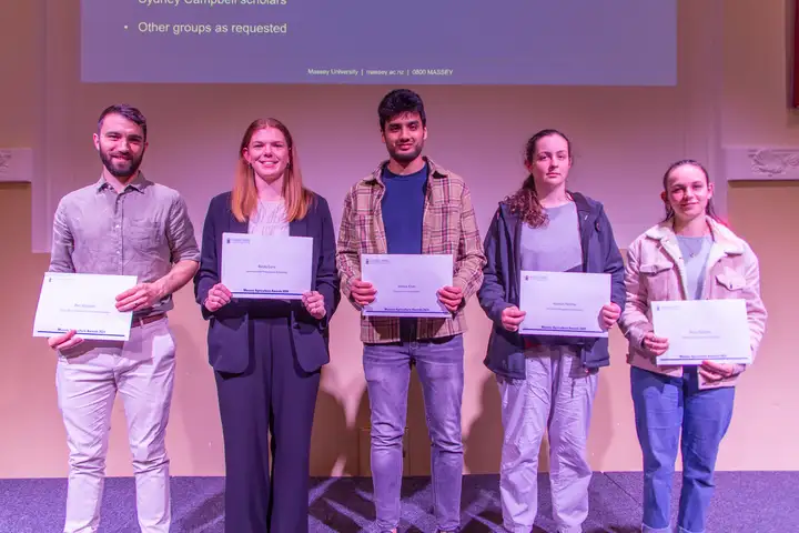 Group of awards with their certificates