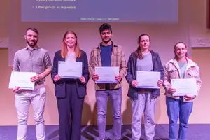 Group of awards with their certificates
