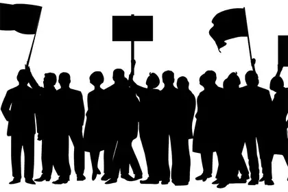 Stock image of protestors in silhouette