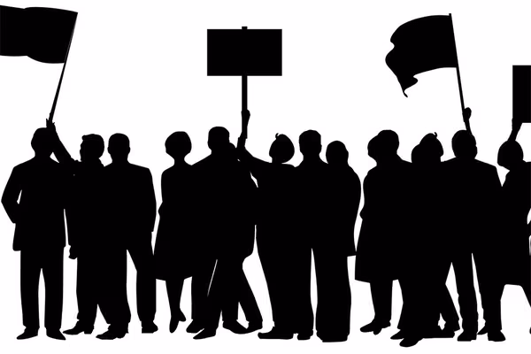 Stock image of protestors in silhouette
