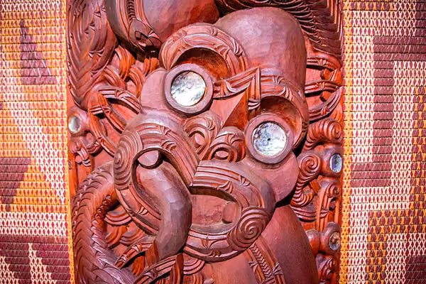 Close-up of a traditional Maori wooden carving