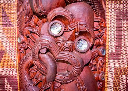Close-up of a traditional Maori wooden carving