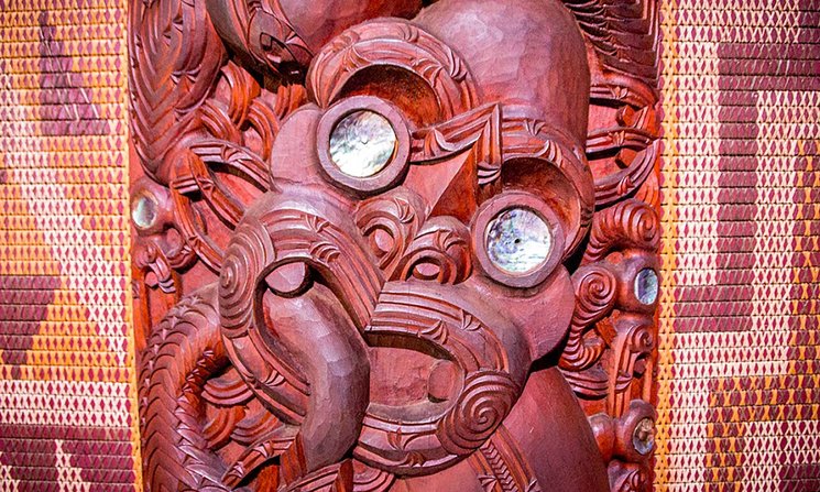 Close-up of a traditional Maori wooden carving