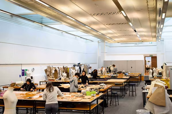 Wide shot of students in fashion studio