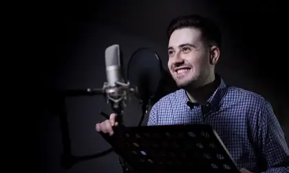 Man talking into microphone