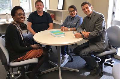 A group of sustainability scholars, including Stuart Carr.