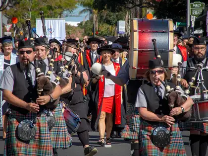 Bagpipe players leading graduation procession in Auckland