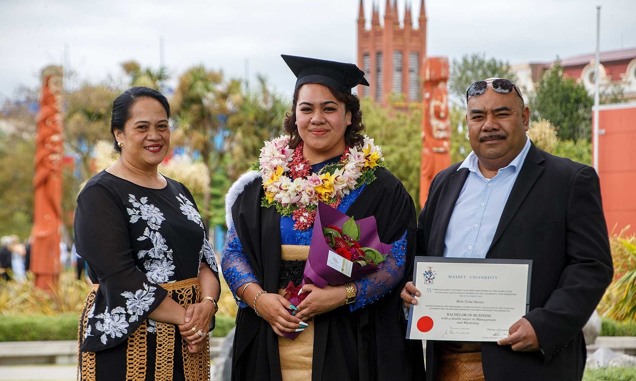 Pacific student with family at graduation