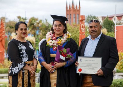 Pacific student with family at graduation