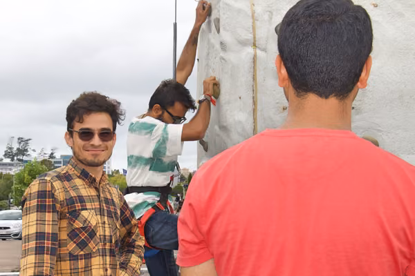International students enjoy rock climbing at Orientation
