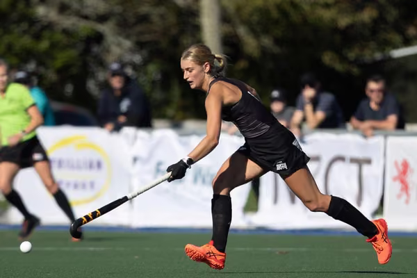 Massey student Katie Doar, playing Hockey. Image credit: Planet Hockey