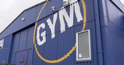 Exterior of blue Wellington Recreation Centre with the word Gym written on it