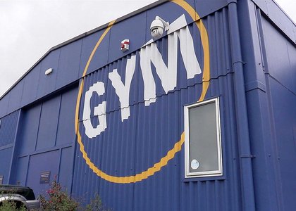 Exterior of blue Wellington Recreation Centre with the word Gym written on it