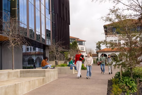 Students outside on campus at Massey University.
