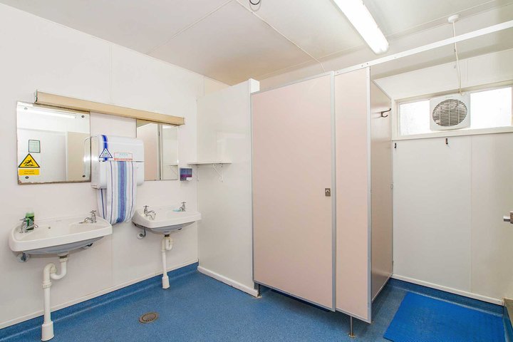 Interior of Kiwitea accommodation's beige bathroom