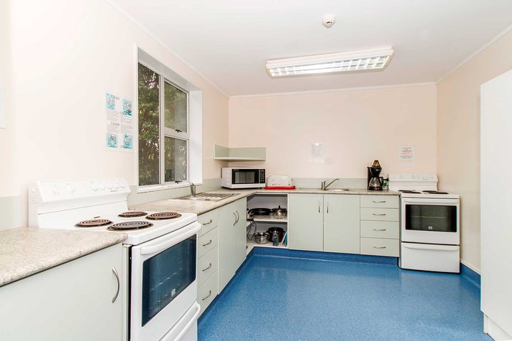 Interior of Kiwitea accommodation kitchen with two ovens