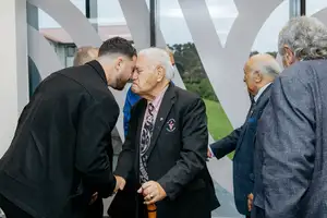 Massey's Principal Advisor Māori - Ōtehā Api Pewhairangi and John Marsden, Te Rūnanga o Ngāti Whātua, greet each other with a hongi.