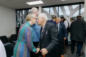 Deputy Vice-Chancellor University Services Shelley Turner greets Reverend John Marsden, Te Rūnanga o Ngāti Whātua.