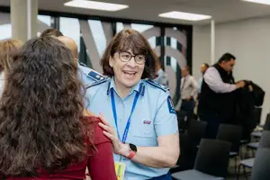 Acting Deputy Commissioner - Northern Districts Jill Rogers greets Massey staff after the blessing.