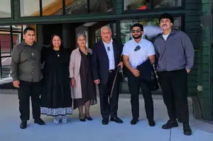Paora Ammunson and his whānau at the pōwhiri to welcome him to Massey.