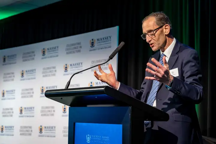 Prof Ray Geor speaking at the awards dinner 2024.