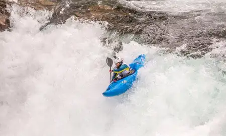 River Mutton kayaking over a waterfall.