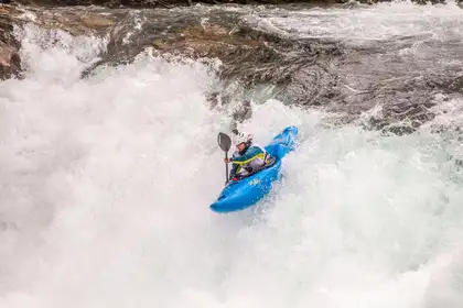 River Mutton kayaking over a waterfall.