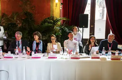 group of judges sitting at a table