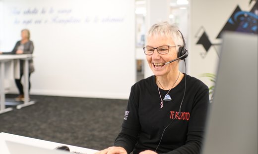 Te Paepoto staff member on phone call with customer