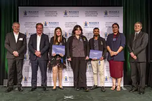Top third-year award winners Melissa Jones, Micheala O’Shea and Aodhan Wildbore with Massey University and government representatives at the Agriculture Awards.