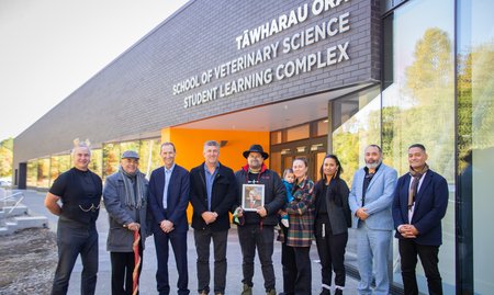 Representatives from Rangitāne, Massey and the construction team outside the new building.