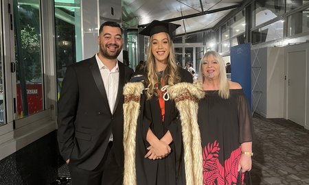 Maia and her brother Kahi Wilson, and mother Kārena Stephens-Wilson at Auckland graduation in May 2022.