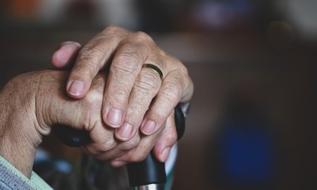 A pair of elderly hands